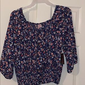 Floral top size XXL fits like a XL